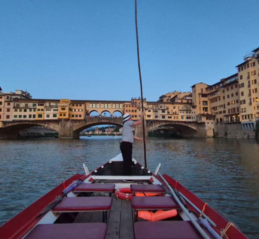 A river cruise on a a traditional gondola through Florence.