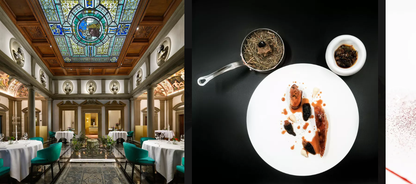 A plated meal and beautifully decorated restaurant Atto.