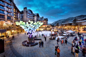 Public square in Vail Village outside Solaris Residences in the winter at night.