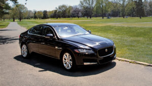 Black sedan Avis car rental through President's Club partnership with Inspirato.