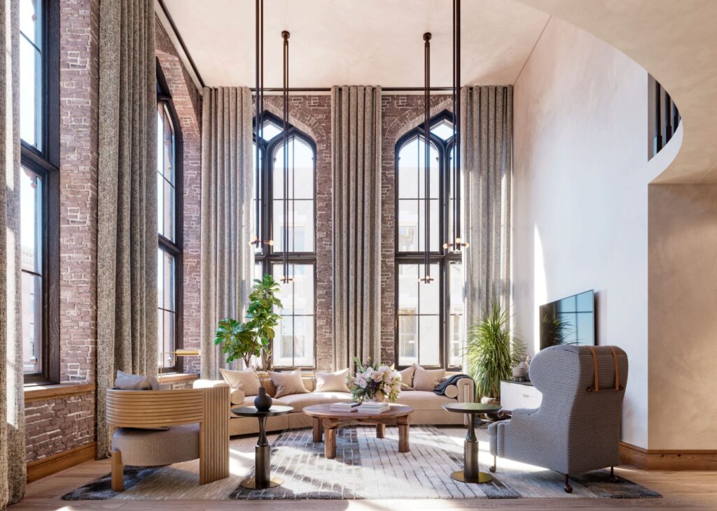 Tall living room of Inspirato home, Heyward, in Charleston historic district with brick walls and chic, neutral furniture.