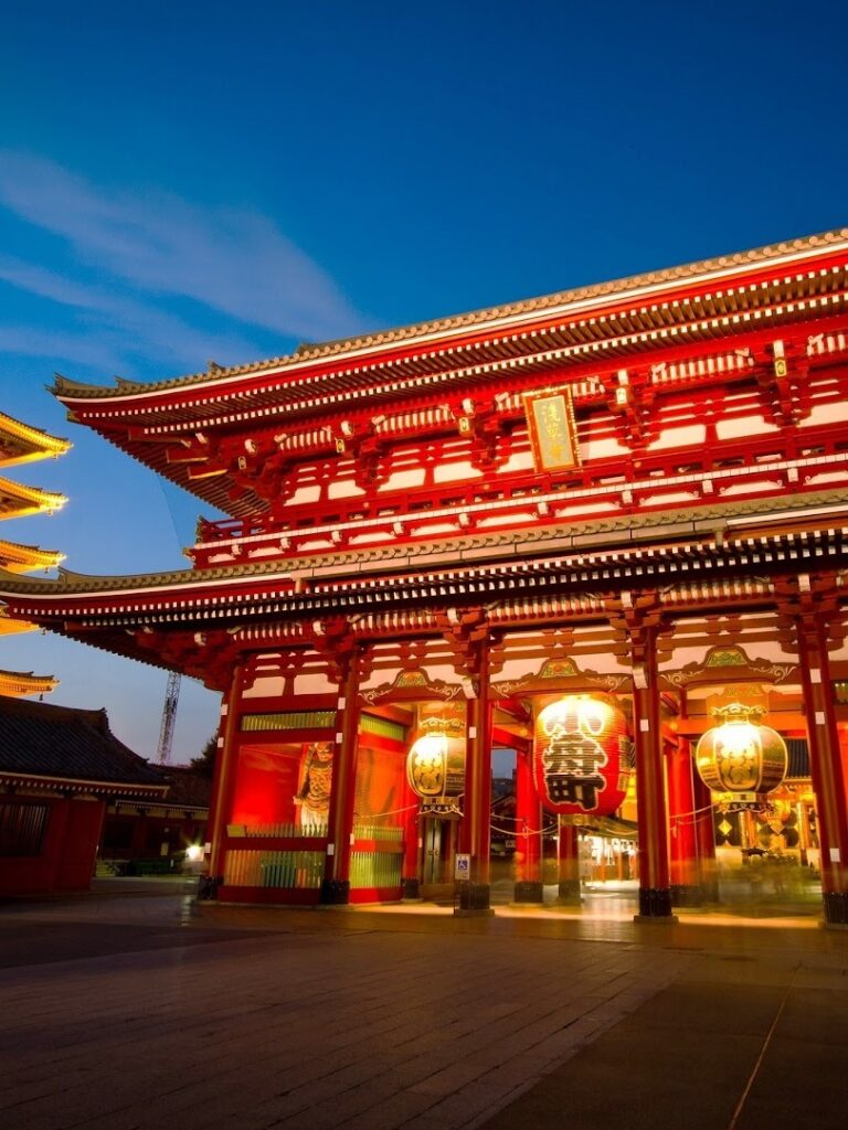 The illuminated main gate of Senso-ji Temple glows at dusk in Tokyo’s historic Asakusa district.