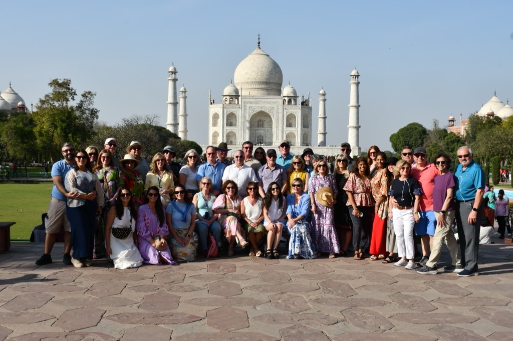 Group of Inspirato members in front of the Taj Mahal