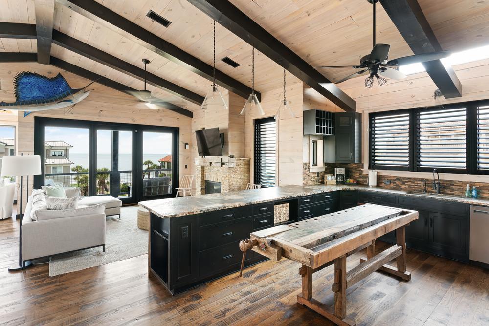 Inspirato home Salt Tide's modern and spacious kitchen and living area