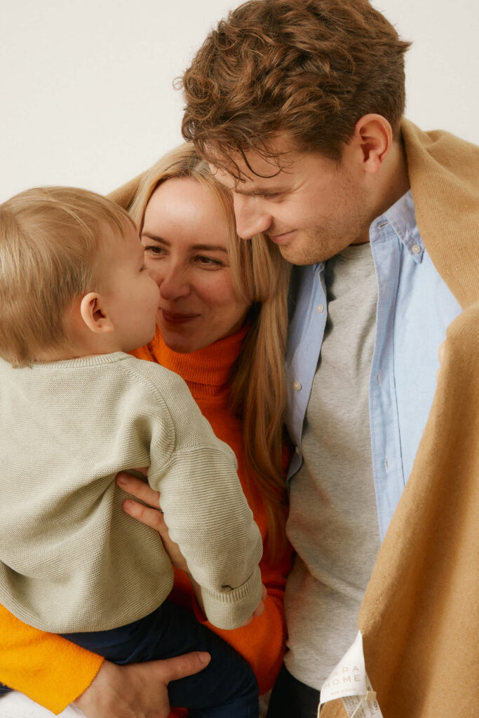 Close-up of a family cozy together at home