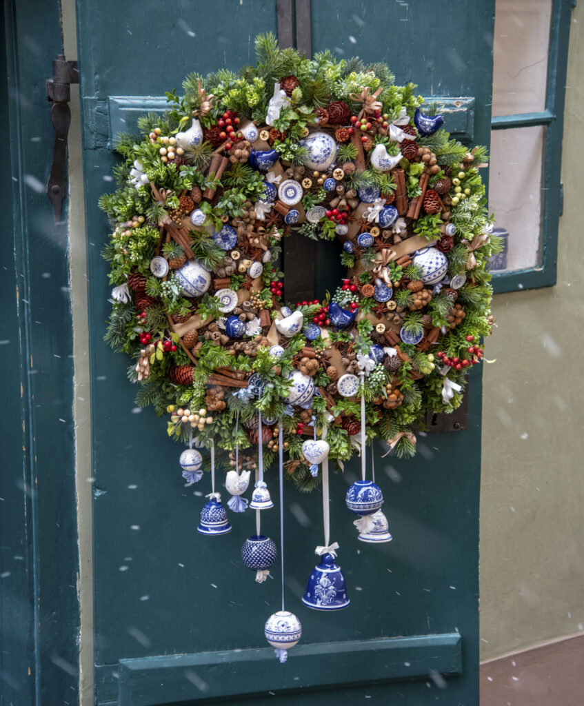 Christmas wreath on a door in Prague