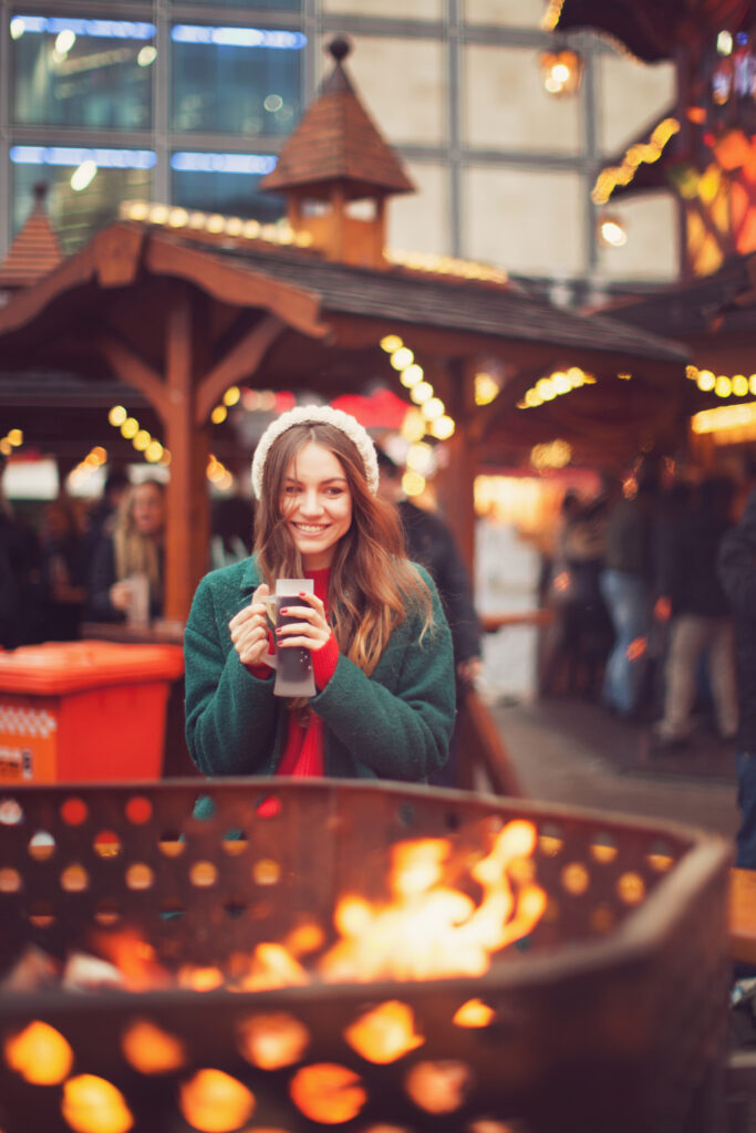 Young woman at a Christmas market in Berlin