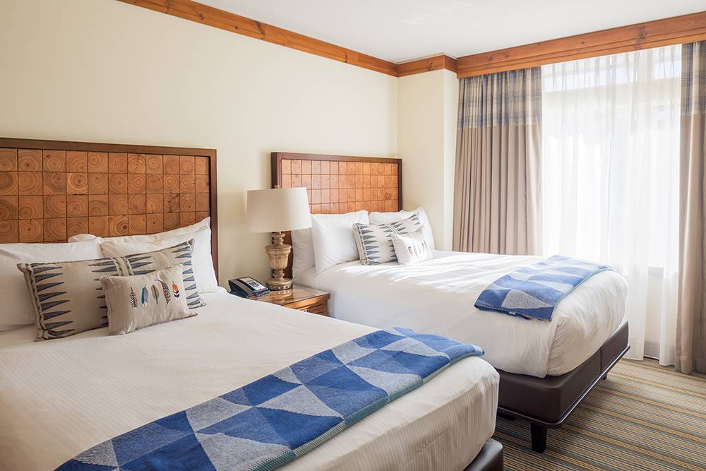 Interior of Basilica di Santo Spirito showcasing Brunelleschi’s architectural design with high ceilings and symmetrical arches.