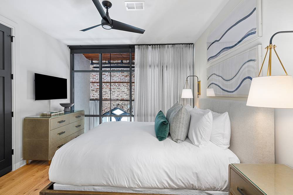 Interior of Basilica di Santo Spirito showcasing Brunelleschi’s architectural design with high ceilings and symmetrical arches.