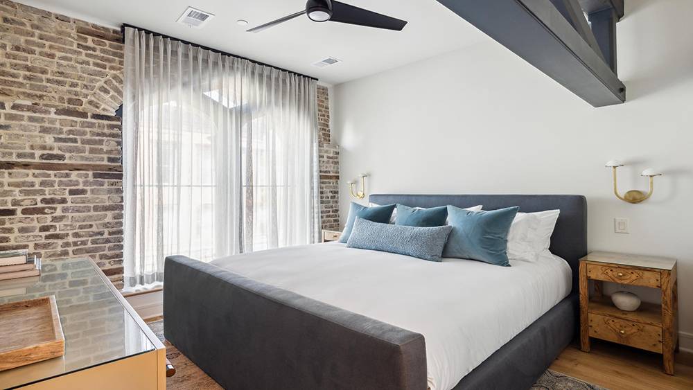 Interior of Basilica di Santo Spirito showcasing Brunelleschi’s architectural design with high ceilings and symmetrical arches.