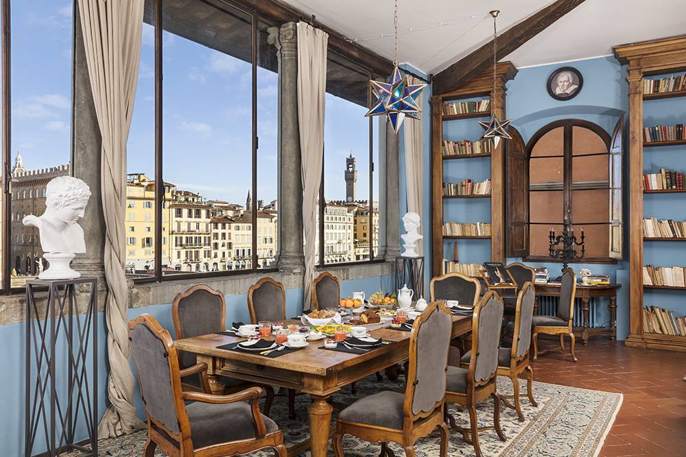 Interior of Basilica di Santo Spirito showcasing Brunelleschi’s architectural design with high ceilings and symmetrical arches.