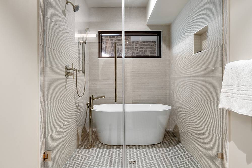 Interior of Basilica di Santo Spirito showcasing Brunelleschi’s architectural design with high ceilings and symmetrical arches.